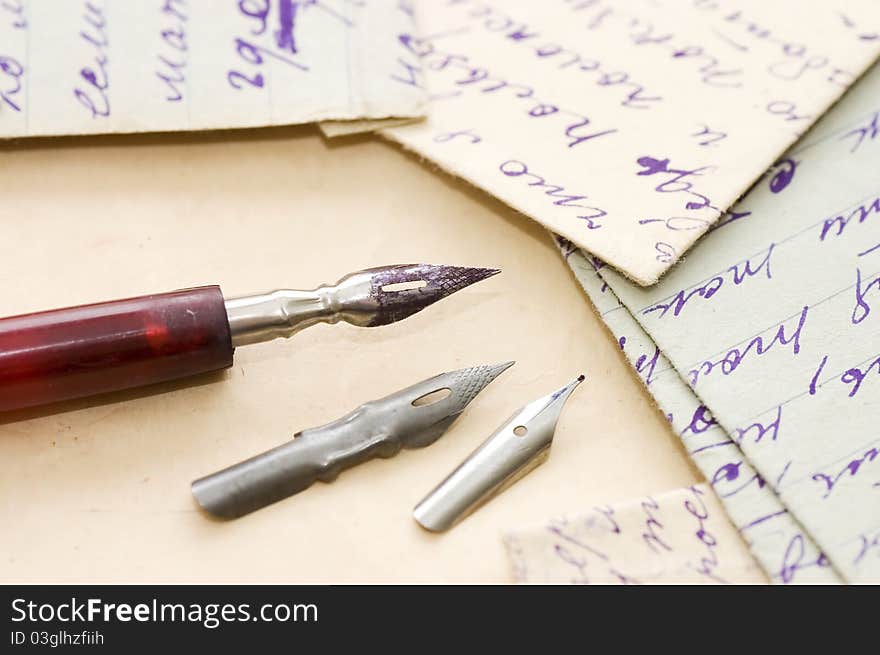 Old letters and pen as a background