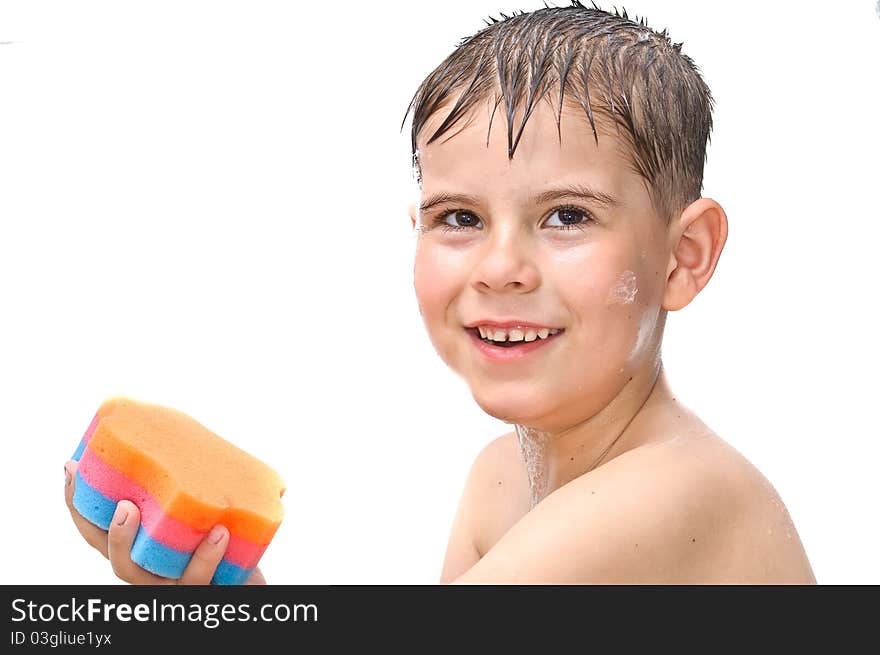 A boy swims in the bathtub. Isolated on white background picture