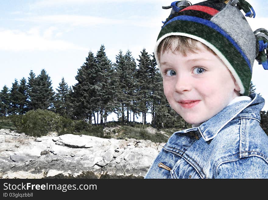 Attractive five year old caucasian boy in hat and jacket at lake park in snow. Attractive five year old caucasian boy in hat and jacket at lake park in snow.