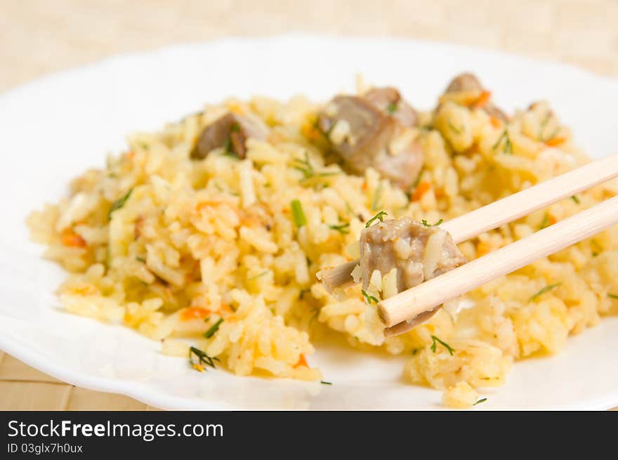 Plate with rice and chopsticks. Plate with rice and chopsticks