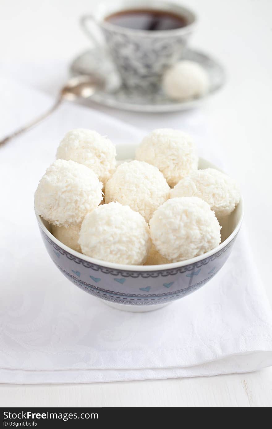 Cup of tea with coconut balls