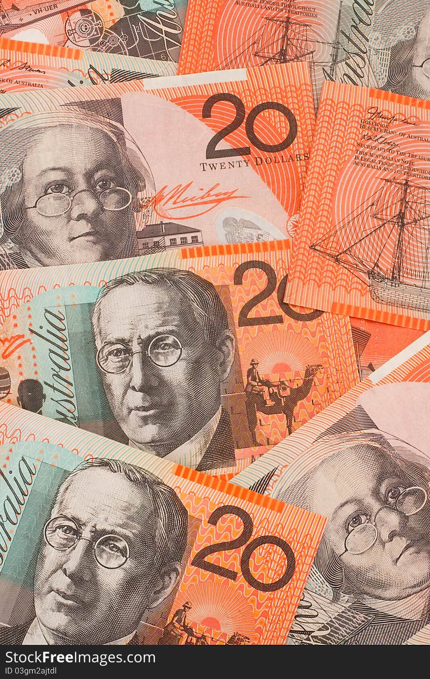 Multiple Australian twenty dollar ($20) banknotes scattered down on top of each other to create a background. Multiple Australian twenty dollar ($20) banknotes scattered down on top of each other to create a background