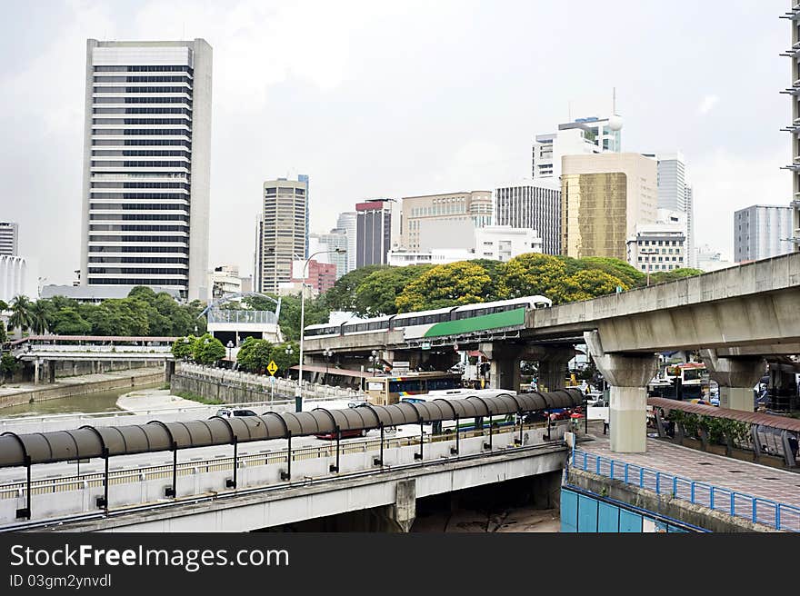 Cityscape with railway and high office buildings in Kuala Lumpur, Malaysia