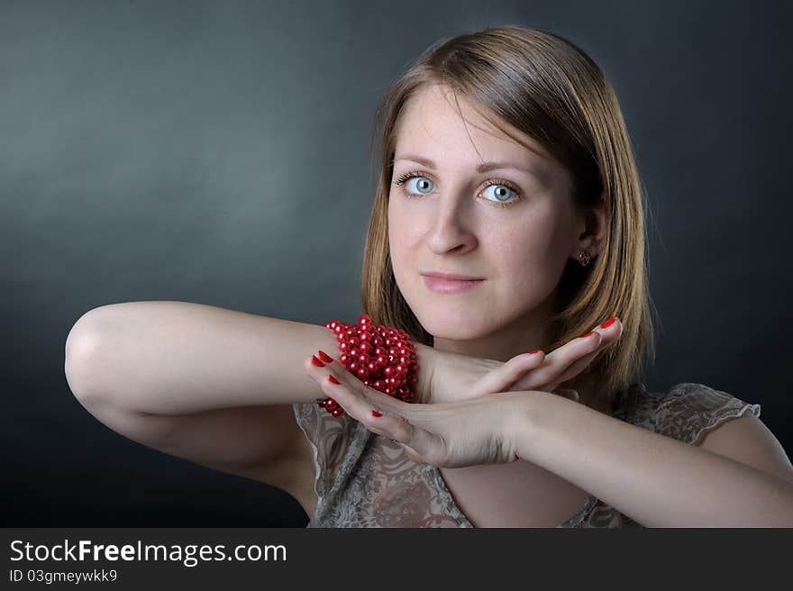 Slim girl in studio on black background