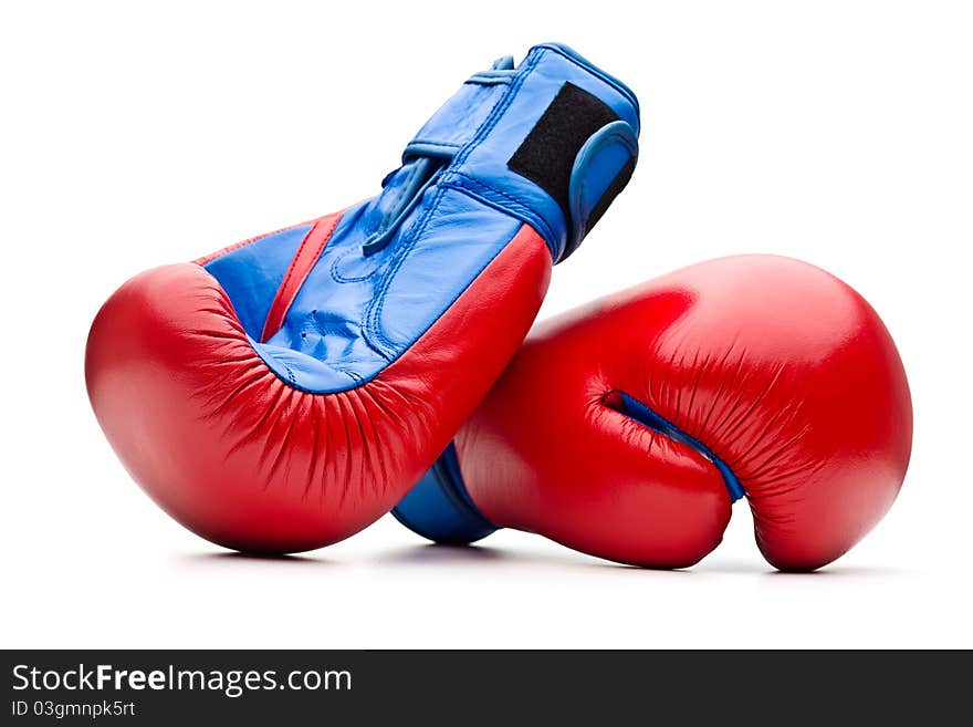 Red boxing gloves on white