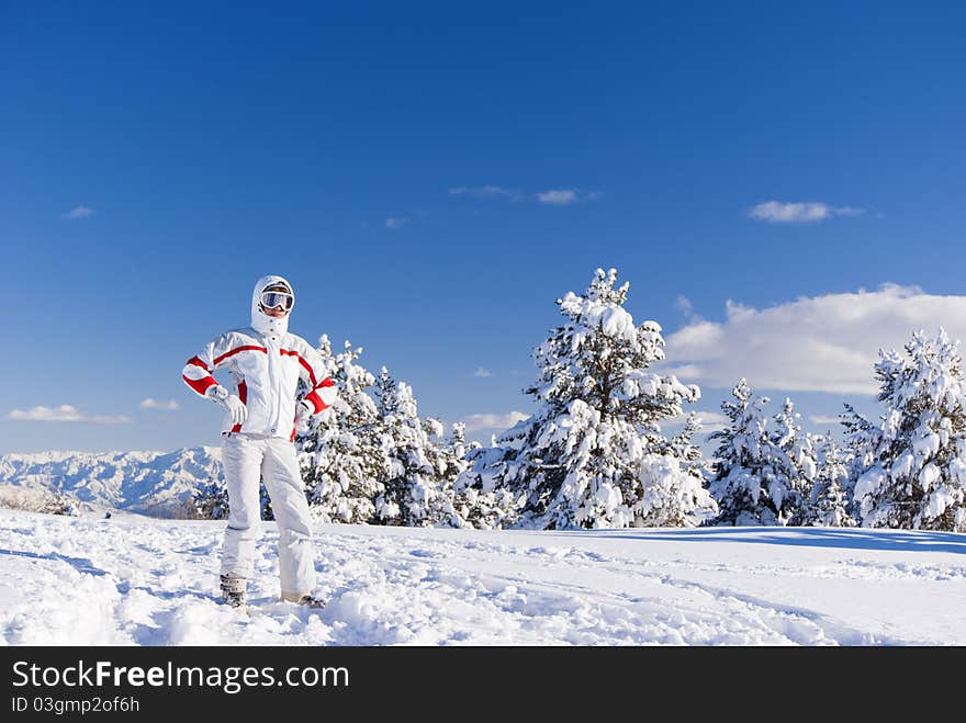 Serious skier on the top of mountain