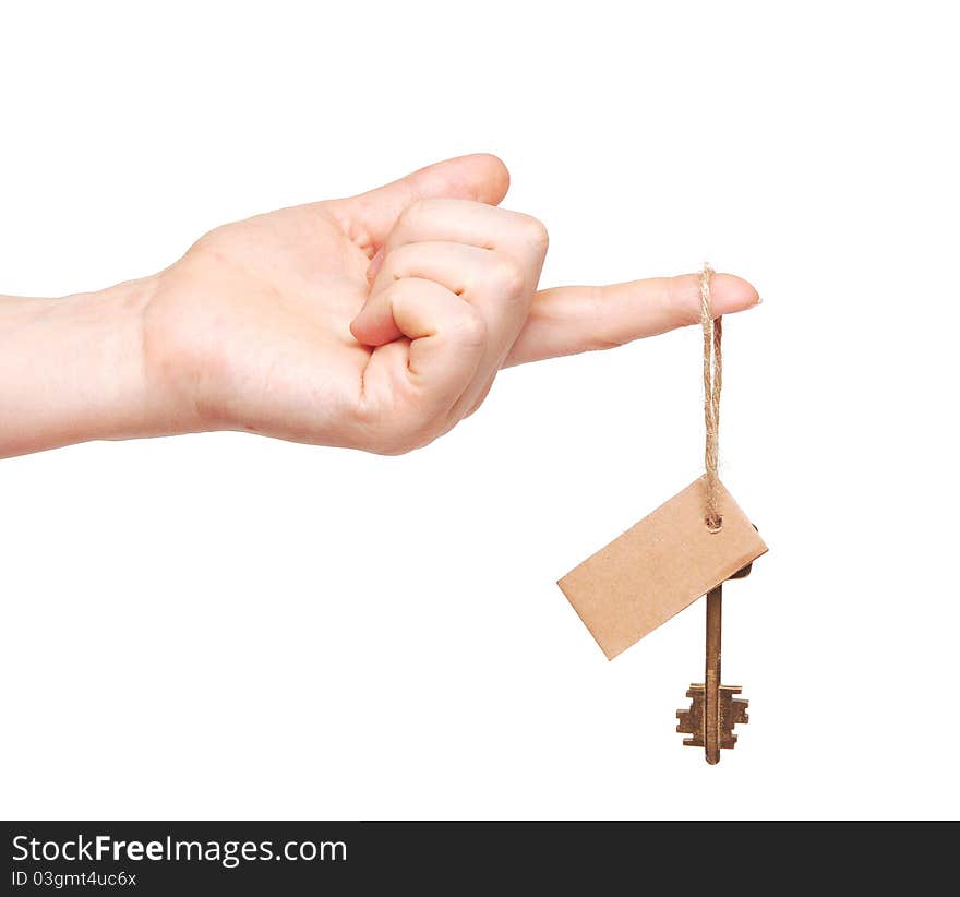 Hand and key with blank label isolated on white background