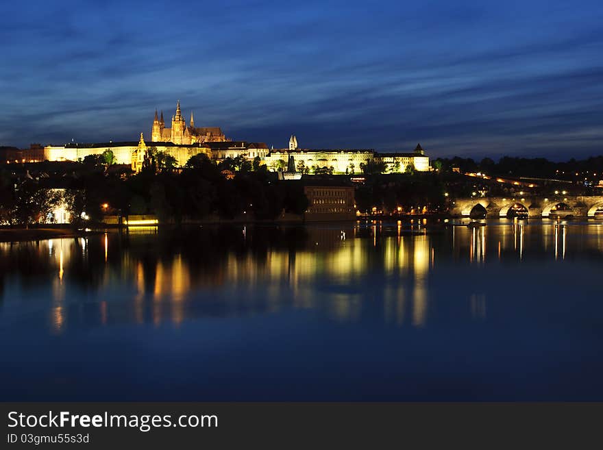 Prague Castle over Vltava river after sunset. Prague Castle over Vltava river after sunset