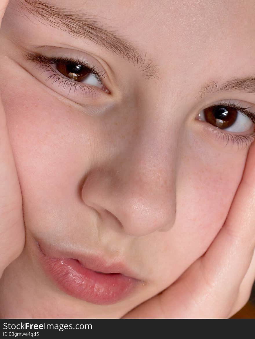 Extreme closeup of a girl looking bored. Extreme closeup of a girl looking bored