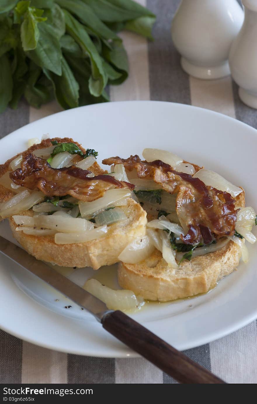 Sourdough with caramelised onions, watercress and bacon. Sourdough with caramelised onions, watercress and bacon