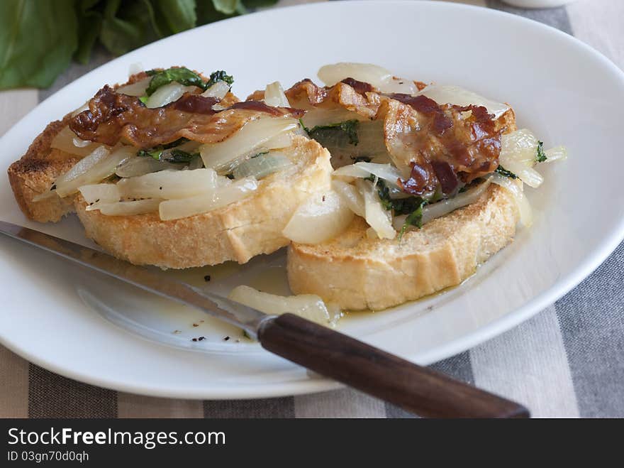 Sourdough with caramelised onions, watercress and bacon. Sourdough with caramelised onions, watercress and bacon