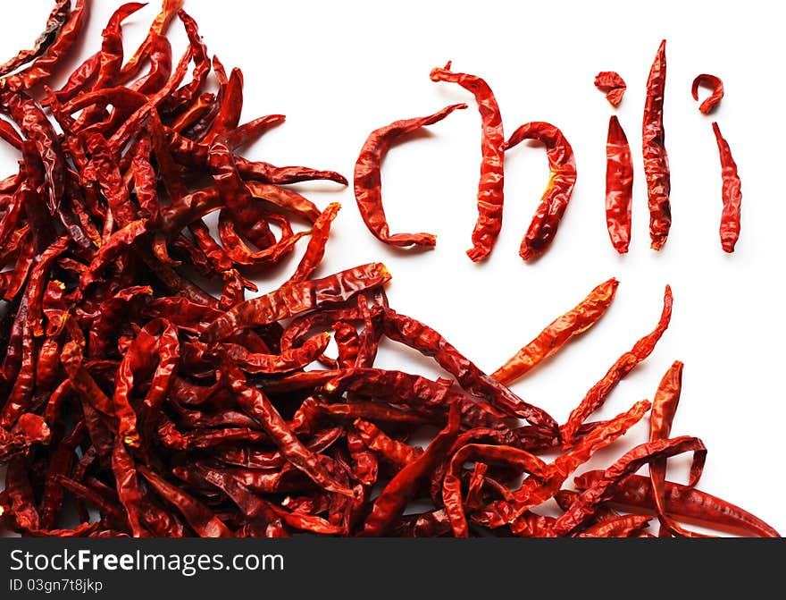 Dried red chili peppers on white background