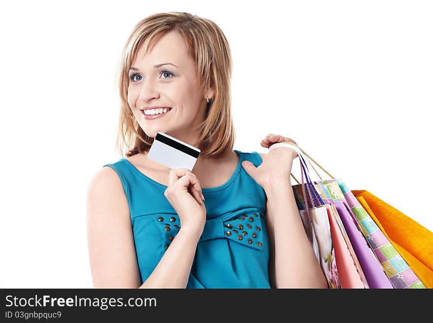 Girl with bags and credit card on a white background. Girl with bags and credit card on a white background