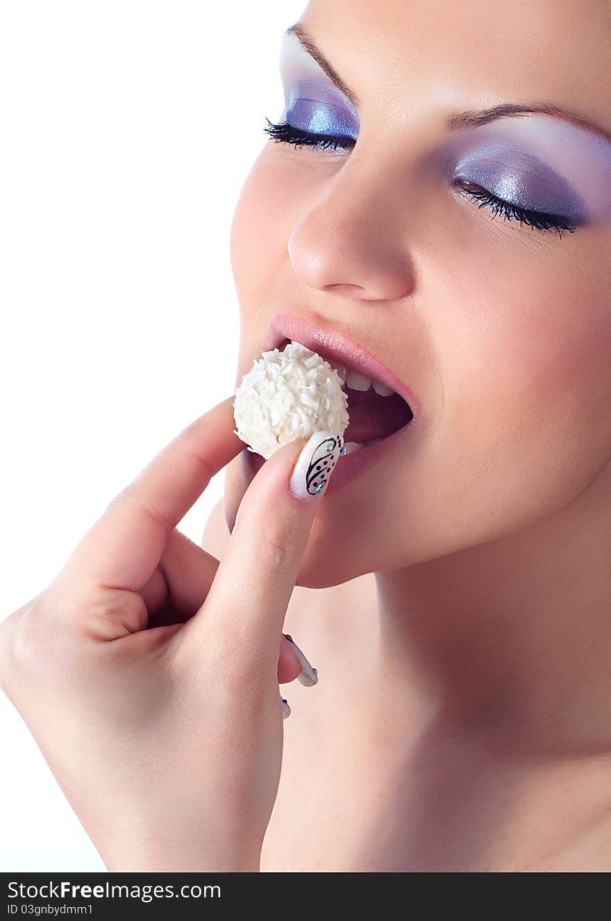 Close up photo of a women with coconut dessert. Close up photo of a women with coconut dessert