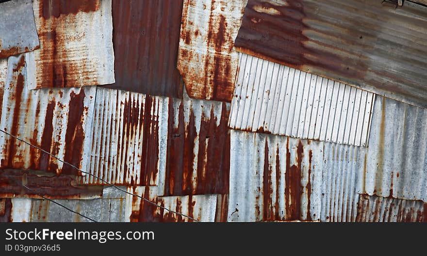 Abstract old rusty galvanized and corrugated steel panel. Abstract old rusty galvanized and corrugated steel panel