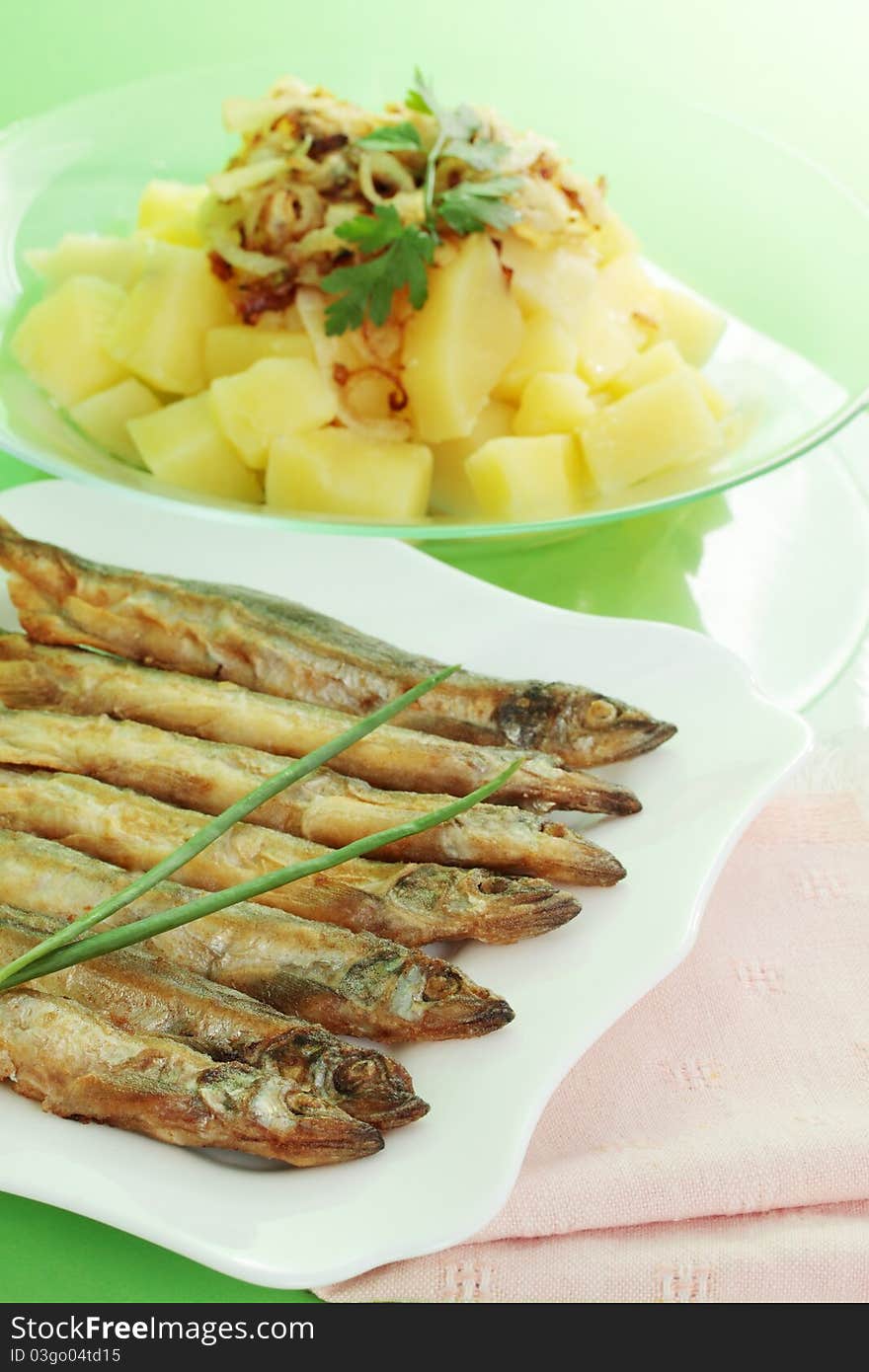 Fried fish of smelts with the potato