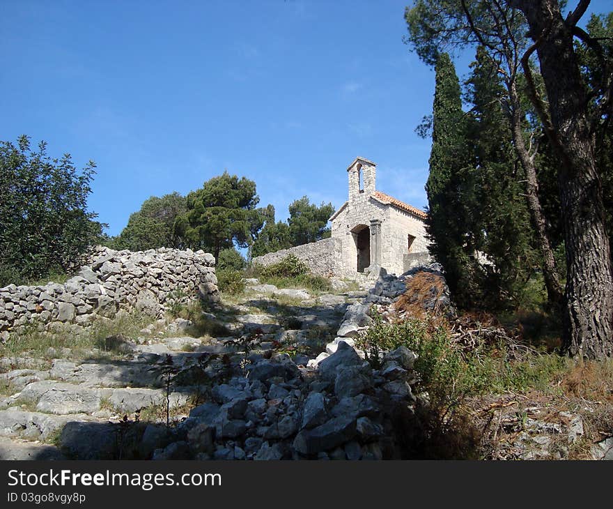 Old stone church on the hill near Hvar town in Croatia