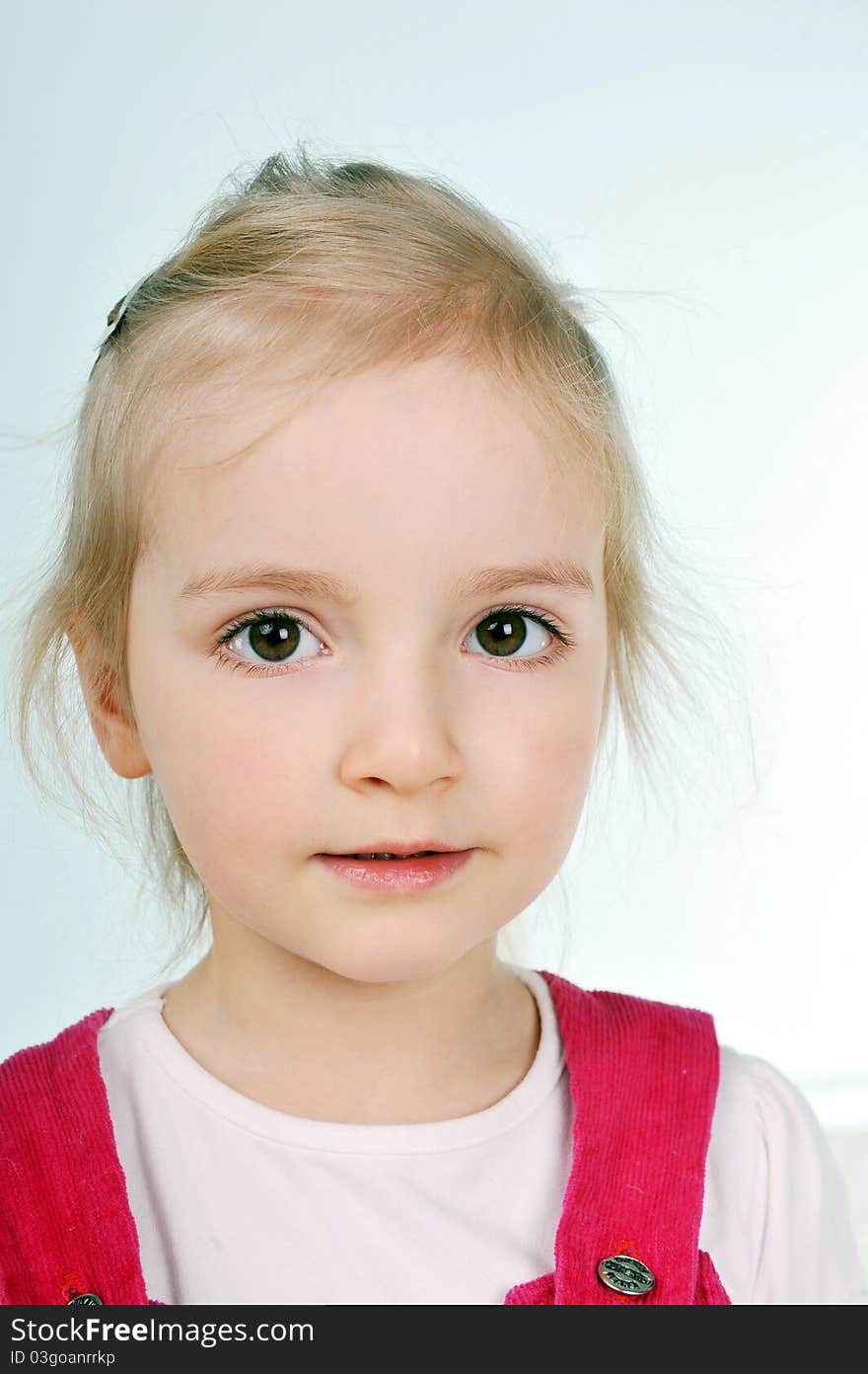 Portrait of lovely blond little girl