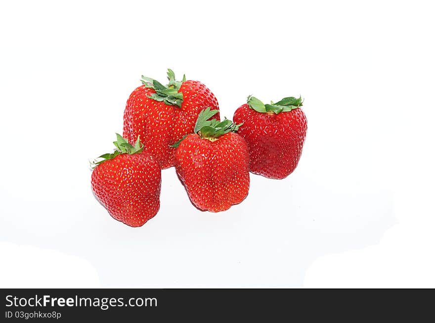 Isolated fruits: strawberries on white background. Isolated fruits: strawberries on white background