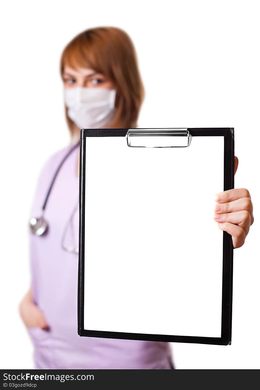 A portrait of young european doctor holding a whiteboard (selective focus). A portrait of young european doctor holding a whiteboard (selective focus)