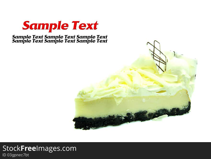 Slice of white cream cake isolated