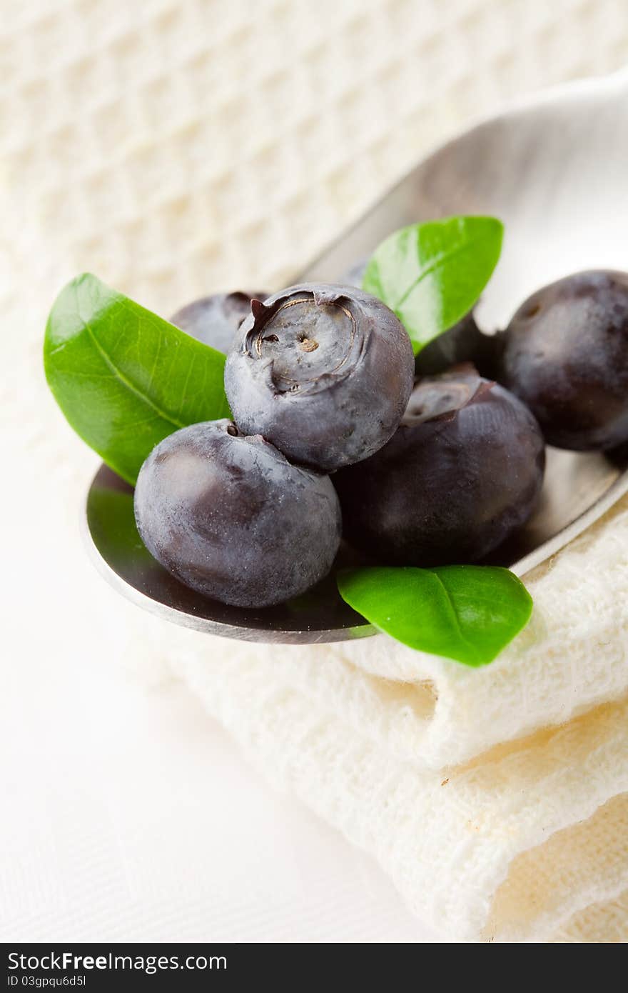 Blueberries on spoon