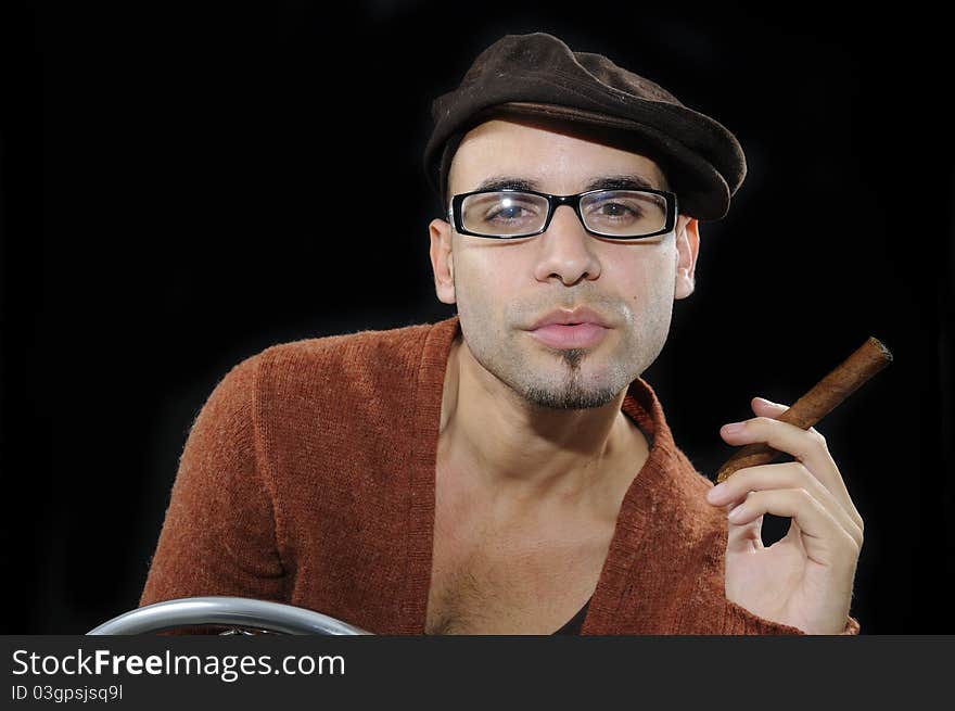 Man Holding Cigar Isolated On Black