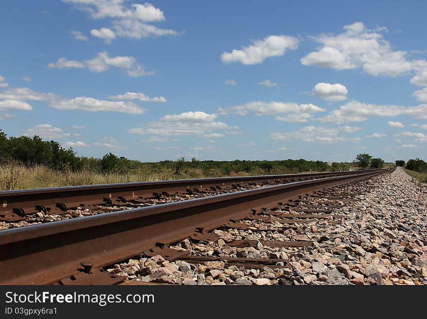 Unique angle of railroad tracks going places