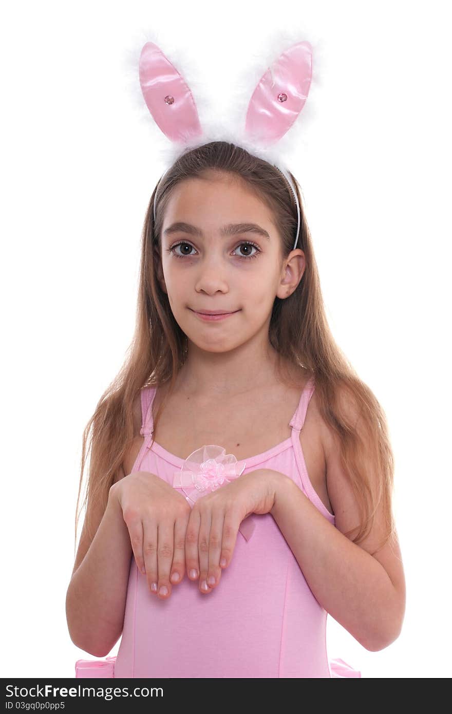 Studio portrait of smiling cute little girl wearing bunny ears isolated on white background. Studio portrait of smiling cute little girl wearing bunny ears isolated on white background