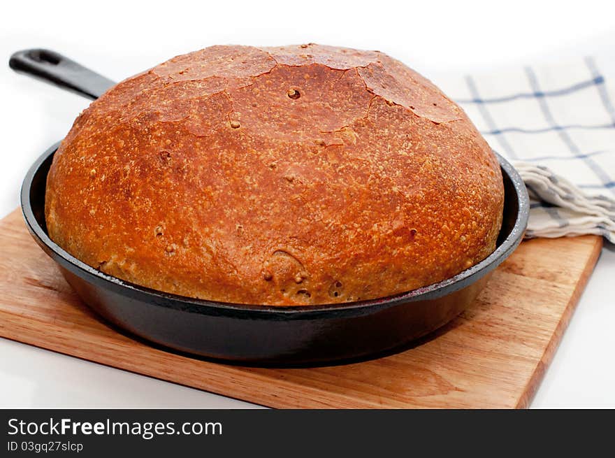 Homemade bread in frying pan