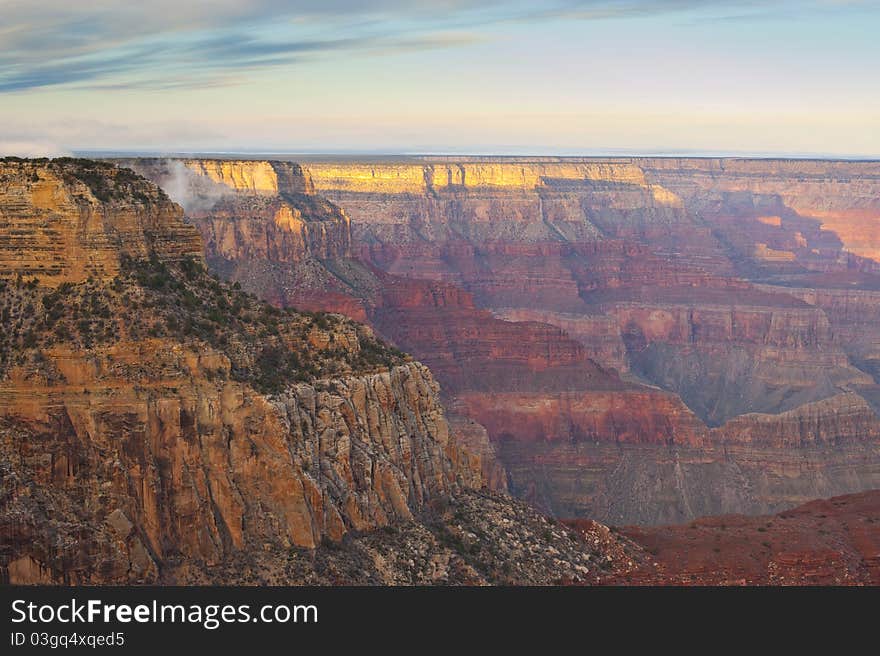 Grand canyon at sunrise with shadow to show the depth and dimension of the layers of the canyon