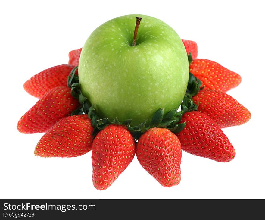 Green apple surrounded with strawberries isolated on white background. Green apple surrounded with strawberries isolated on white background.