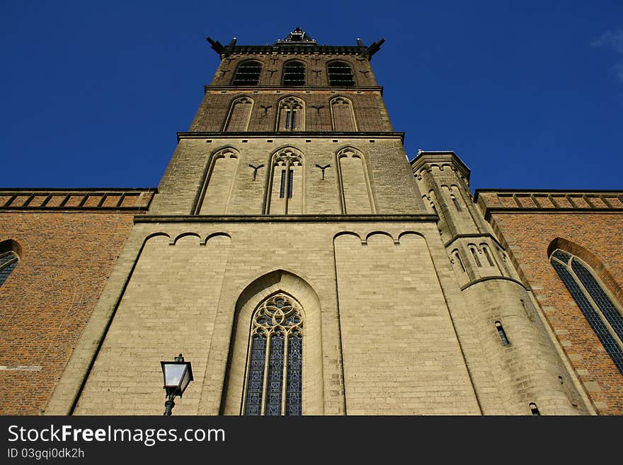 Sint Stevenstower Nijmegen the Netherlands, backside of a dutch churchtower against blue sky. Sint Stevenstower Nijmegen the Netherlands, backside of a dutch churchtower against blue sky