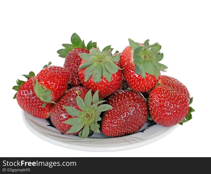 Fresh strawberry on plate isolated over white background