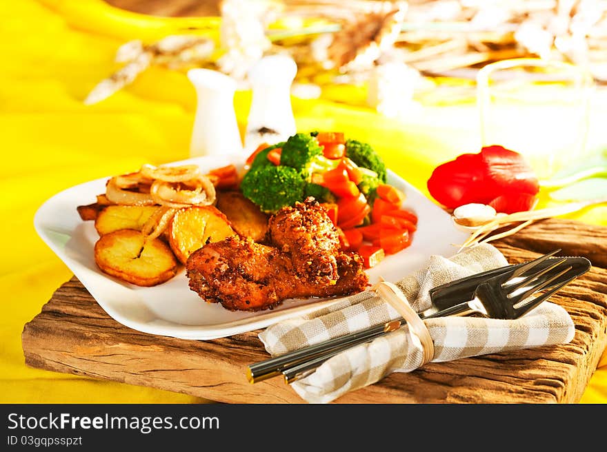 Fried potatoes with vegetables and chicken