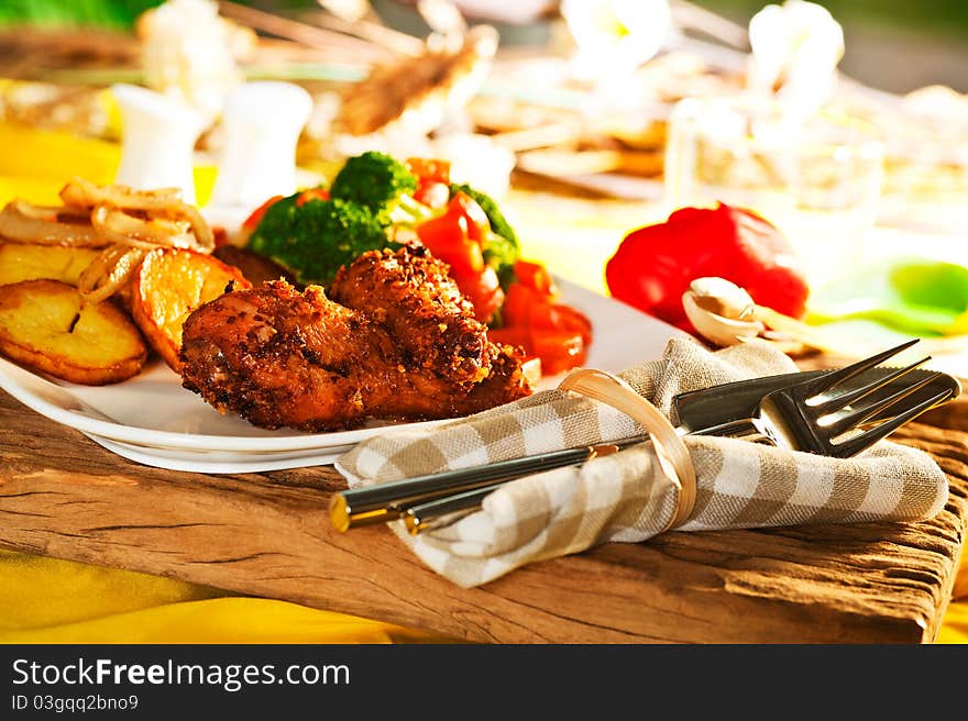 Fried potatoes with vegetables and chicken