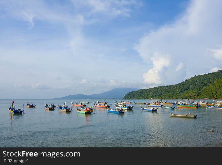 Fishing boats park on near beach