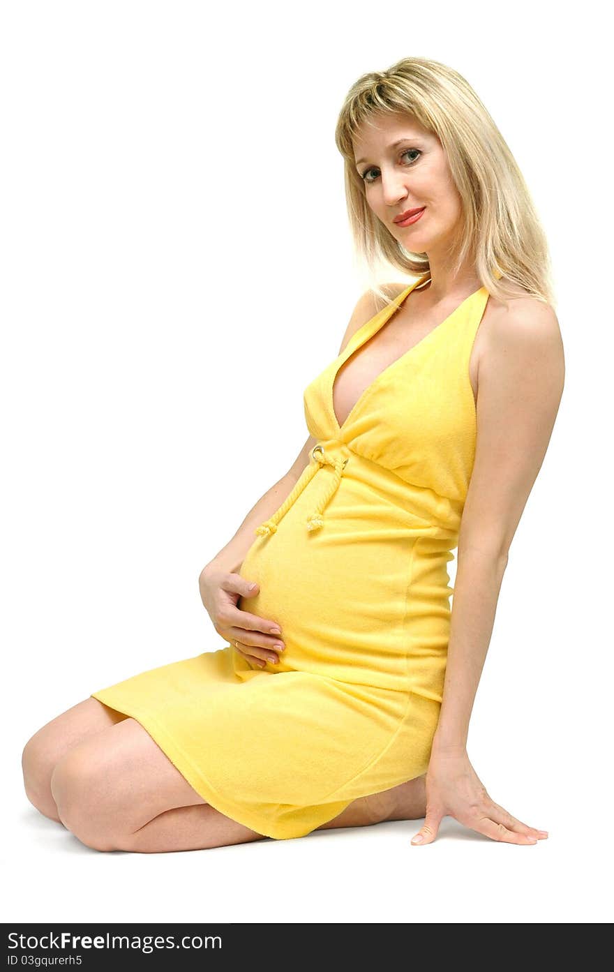 Pregnant woman smiles