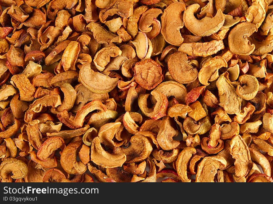 Background of dried slices apples, group of dry slices of apple. Background of dried slices apples, group of dry slices of apple.