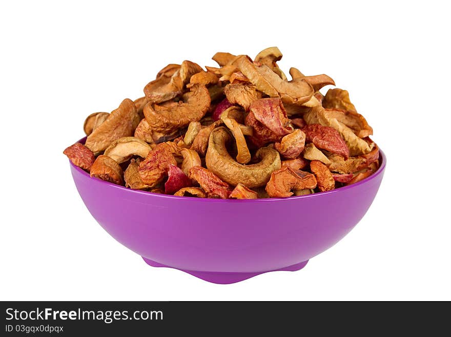 Organic dried apples in bowl, isolated on white background.group of dry slices of apple in bowl.