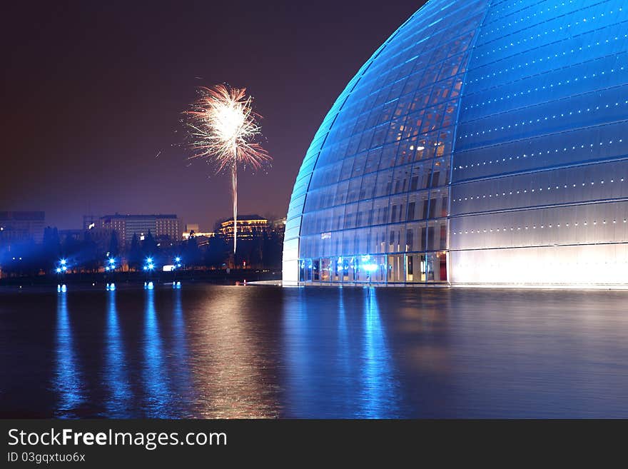 This picture was taken beside the china opera hall in winter.in spring festival people of china always play firework to celebrate.the opera hall is a landmark of beijing. This picture was taken beside the china opera hall in winter.in spring festival people of china always play firework to celebrate.the opera hall is a landmark of beijing.