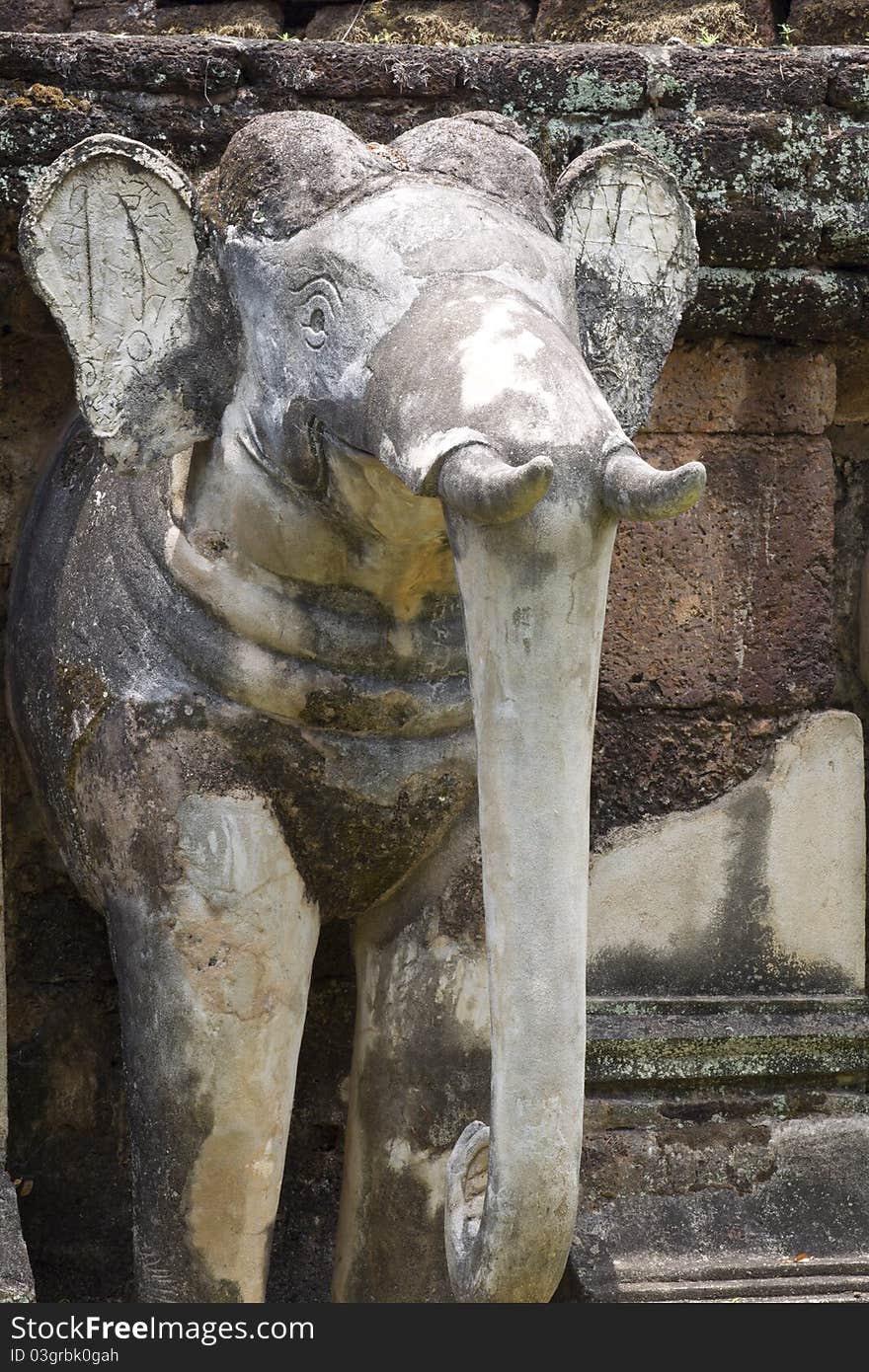 Elephant Statue beside the pagoda base. Elephant Statue beside the pagoda base.