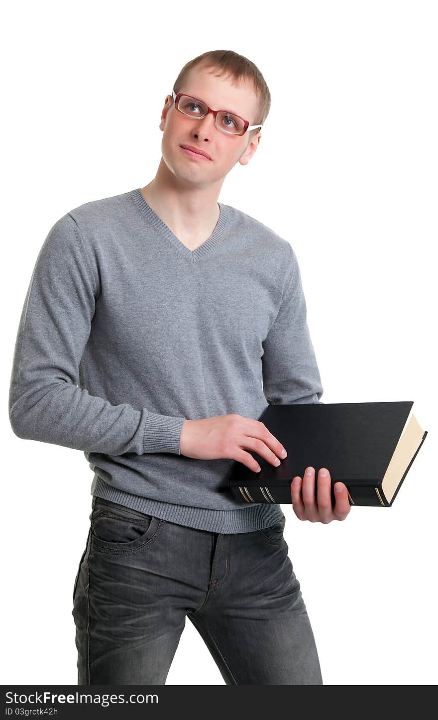 Young student in glasses with a book