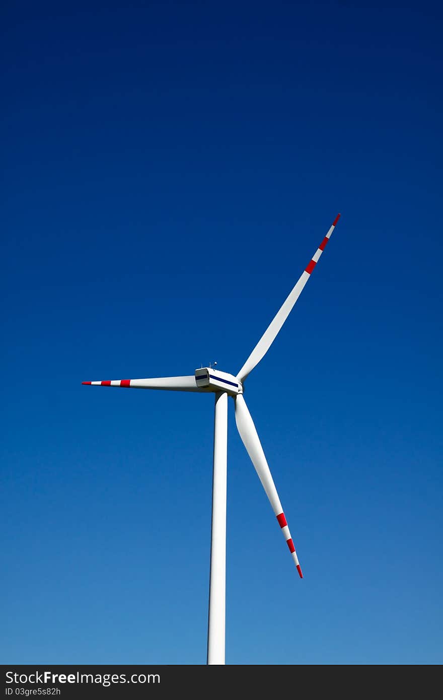 Windmill on the clean blue sky. Windmill on the clean blue sky