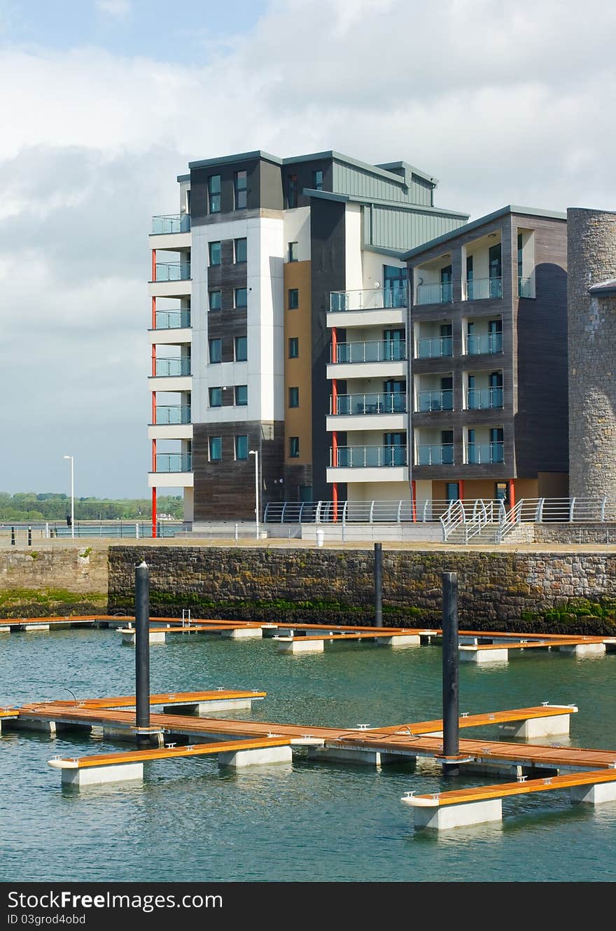 Caernarfon marina with the newly built water front development behind. Caernarfon marina with the newly built water front development behind.