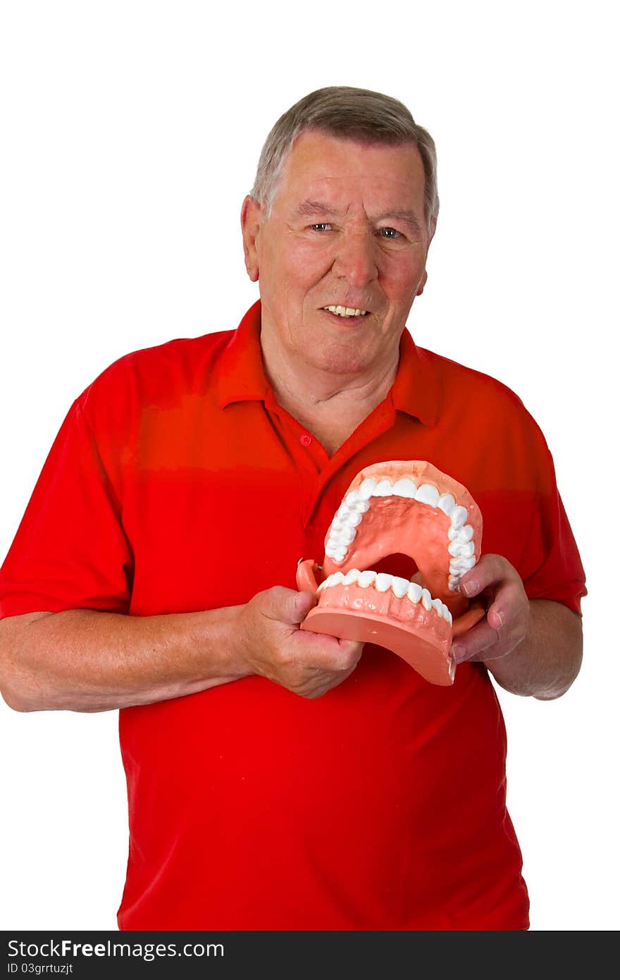 Senior with teeth model