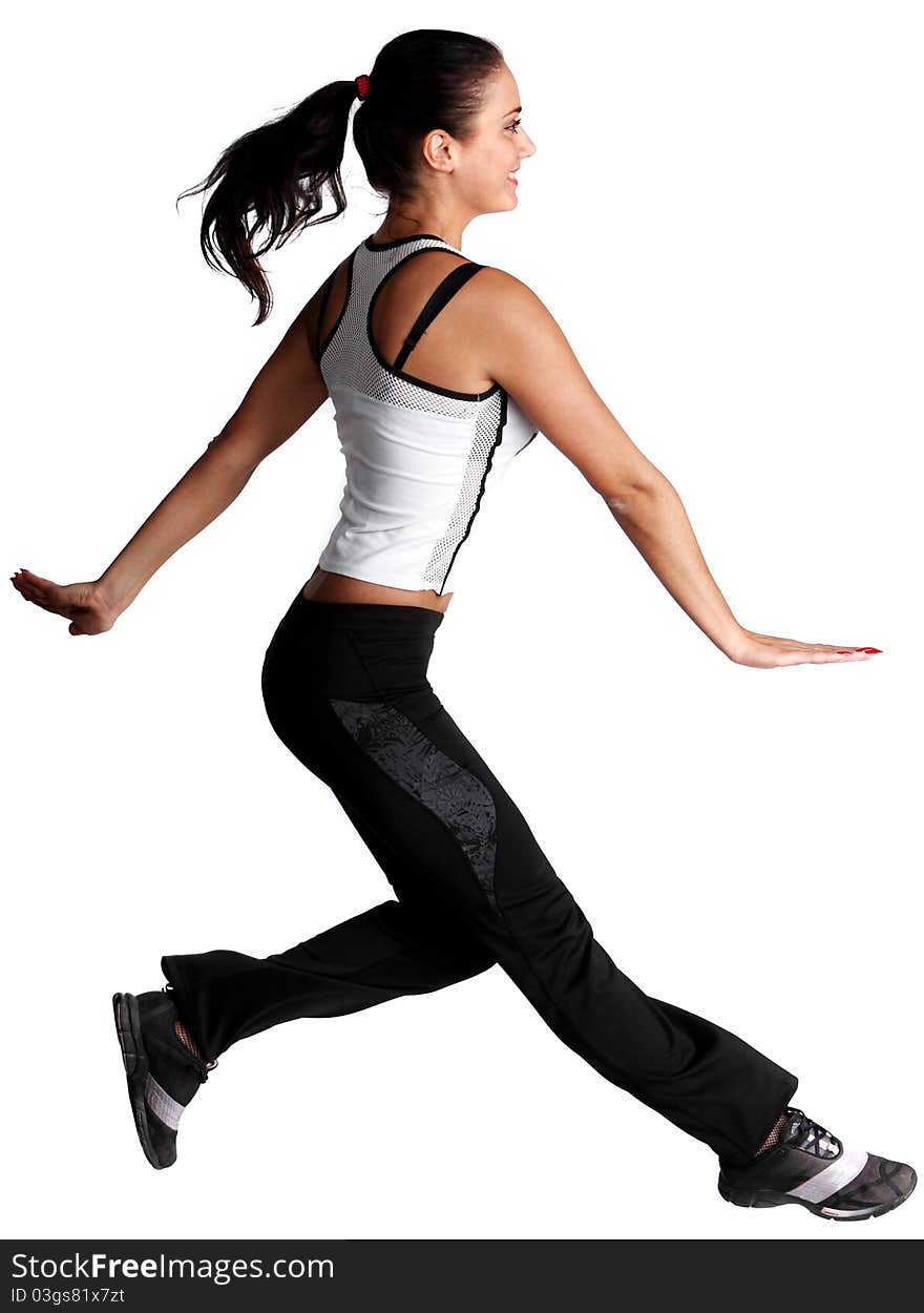 Young beautiful woman jumping in the studio. Young beautiful woman jumping in the studio