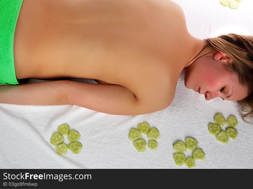 Lovely young woman smiling in a spa salon. Lovely young woman smiling in a spa salon