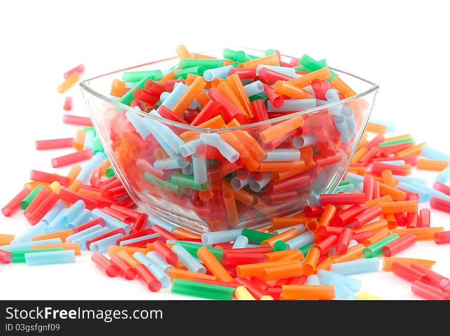 Bunch of colorful straws on white background