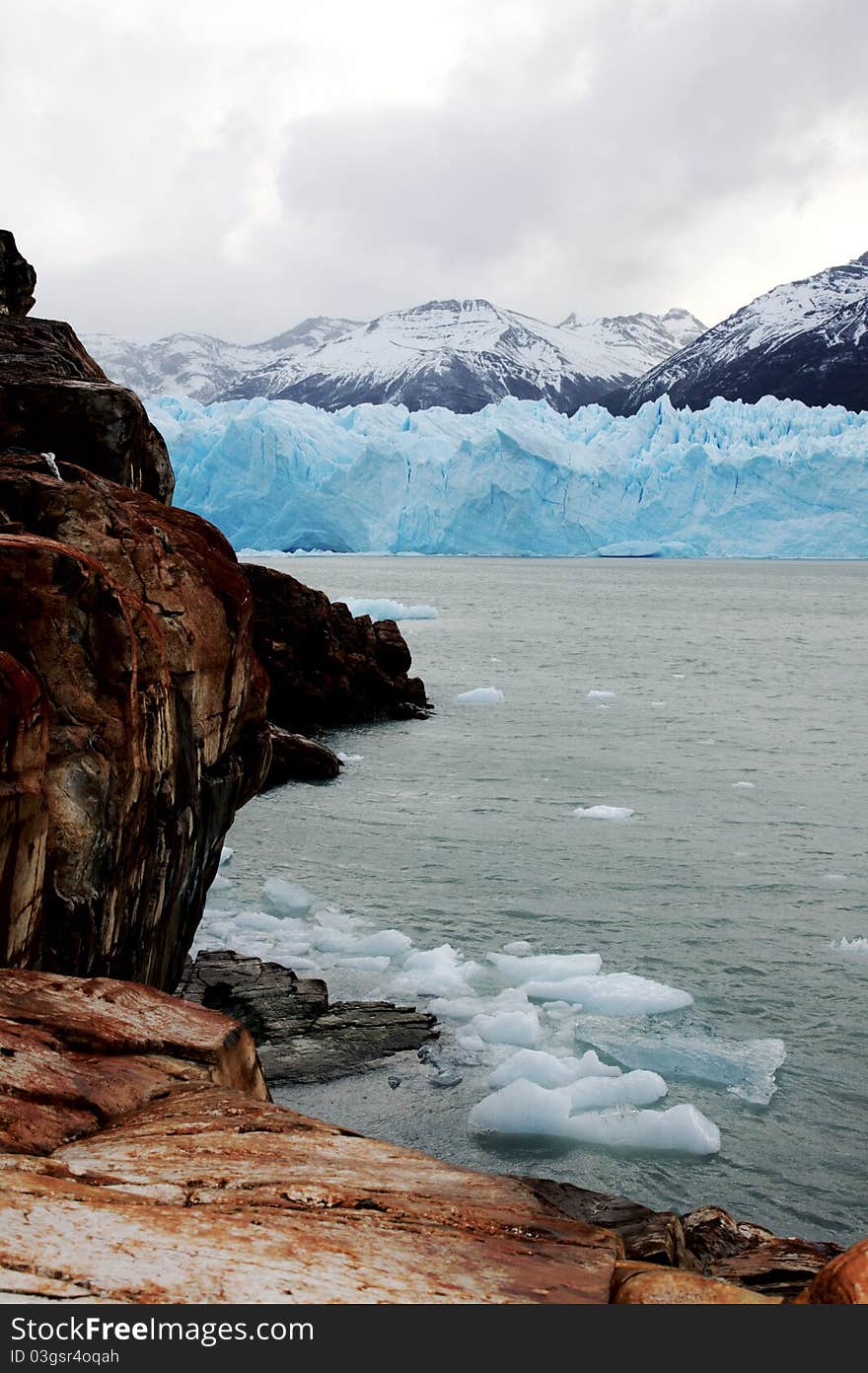 Rocks framing the scenic Perito Moreno. Rocks framing the scenic Perito Moreno